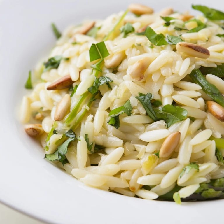 Perfect for a sunny picnic or light lunch, this Asparagus Lemon Orzo Salad features crisp greens and a bright citrus aroma, ready to serve in just 25 minutes.